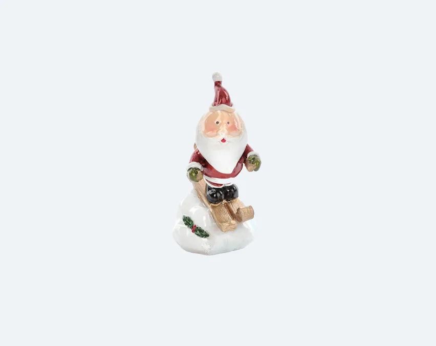 Santa Claus figurine ornament in a red and white suit