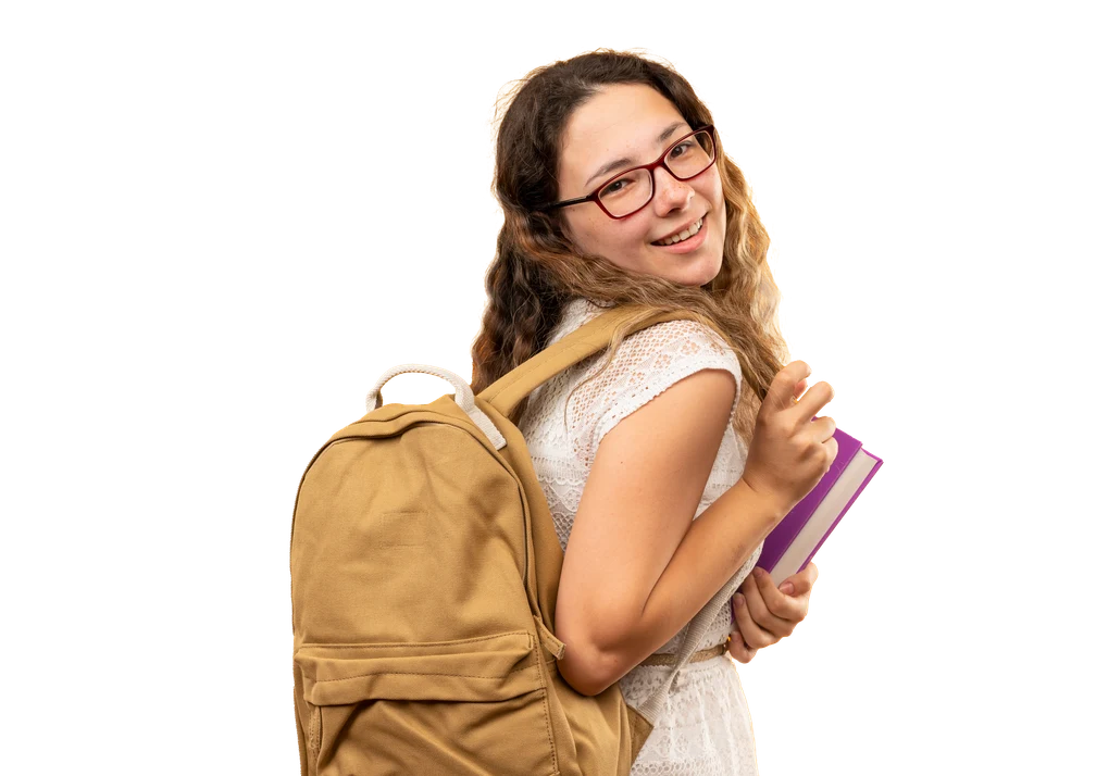 Smiling student in glasses with a backpack, holding a book