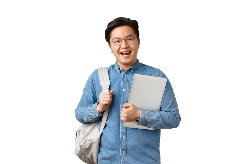 Smiling student with a backpack holding a laptop