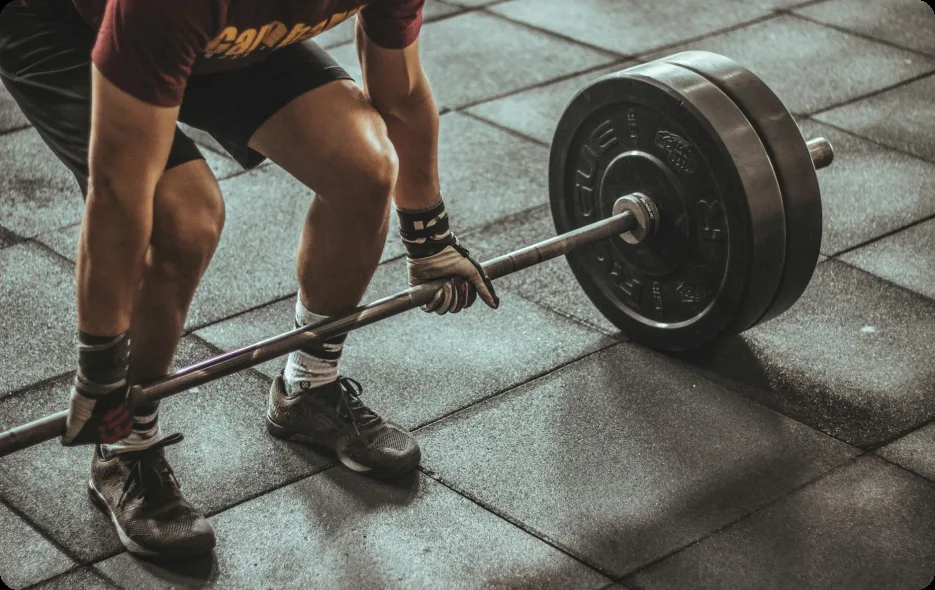 Athlete setting up for a heavy barbell deadlift