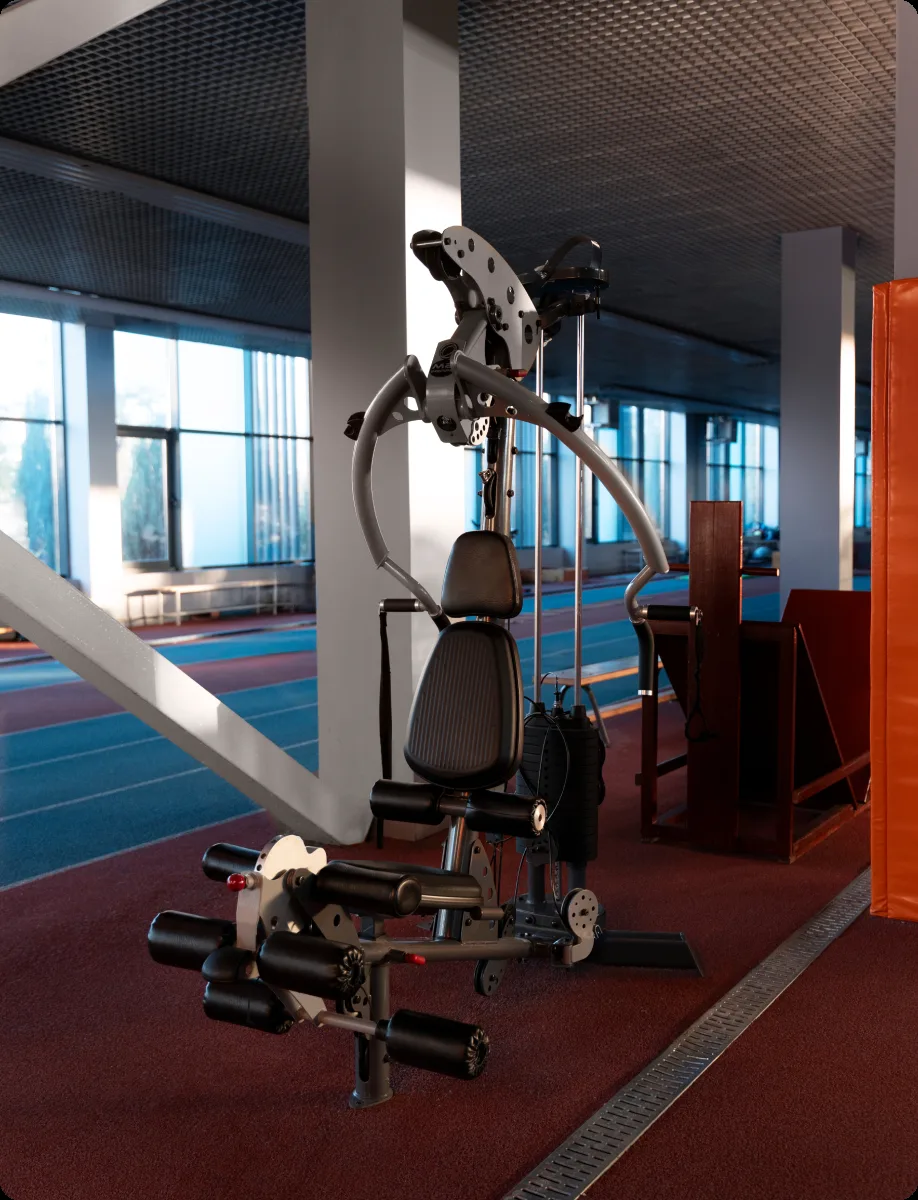 Downtown Studio training floor with cable machines beside floor-to-ceiling windows