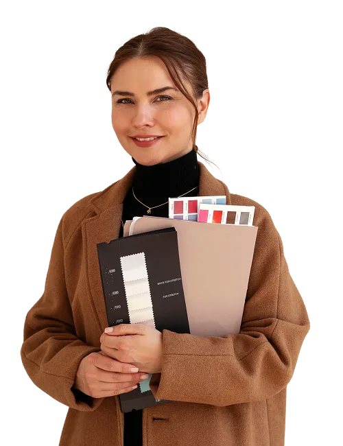 Noah Bennett, head of product design, with fabric swatches and folders