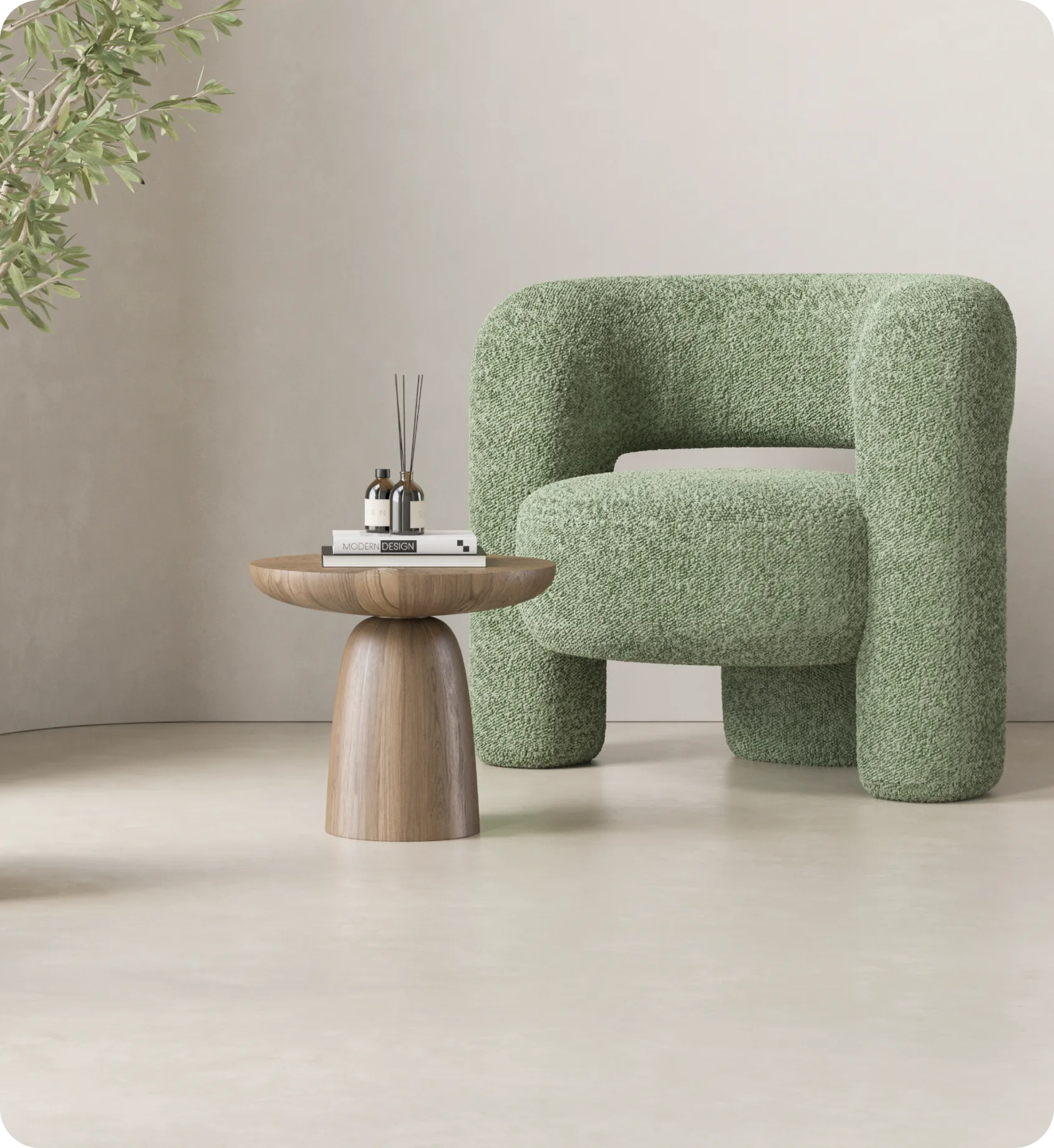 Sage boucle armchair beside a round wood side table in a sunlit living room