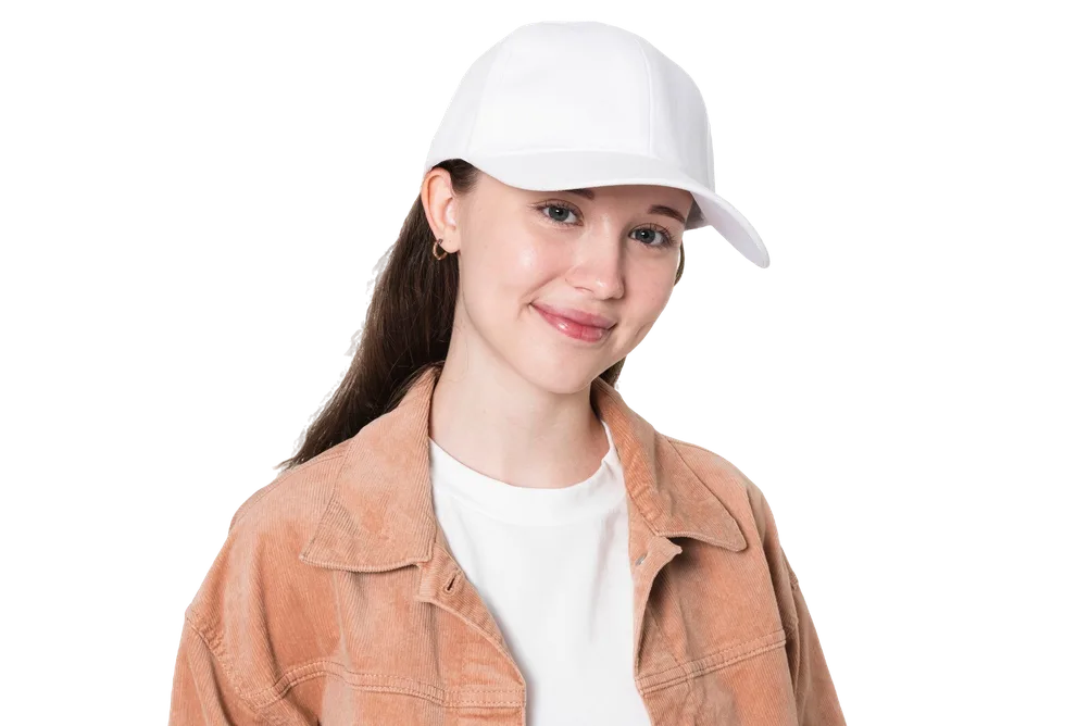 Teenage girl in a white baseball cap and cropped jacket