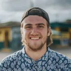 Portrait of a young man wearing his cap backwards