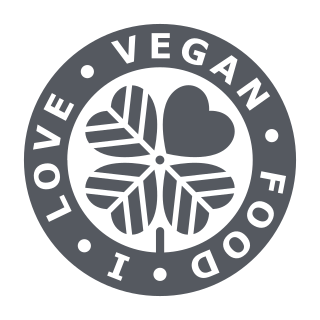 Lovegreen brand mark, a circular Vegan Love Food badge of leaves around a heart
