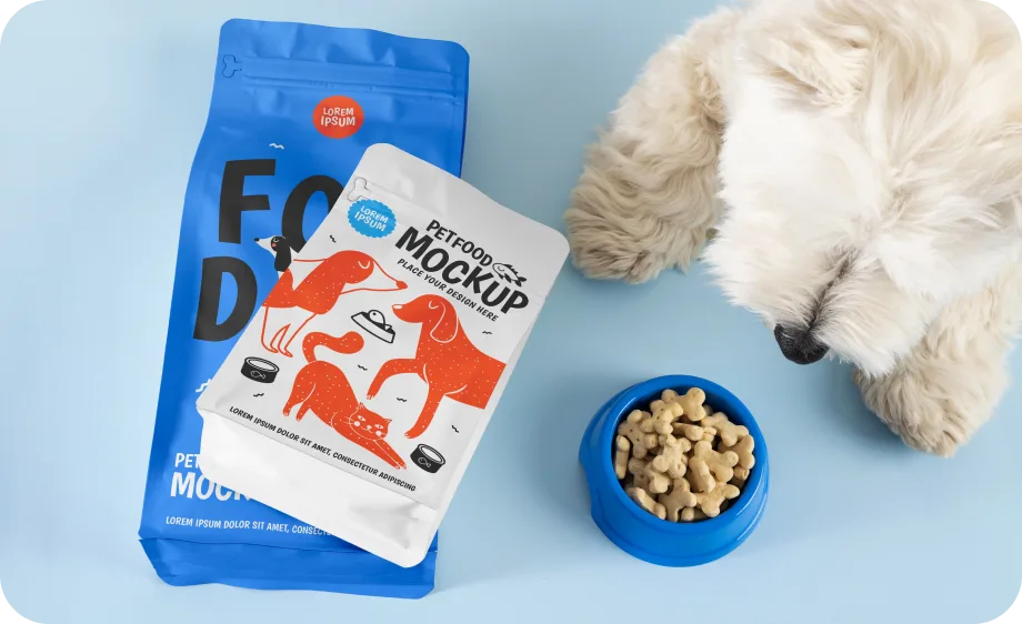 White dog sniffing a bowl of kibble next to a bag of dog food