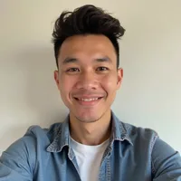 Portrait of a smiling customer in a denim shirt
