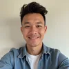 Portrait of a smiling man in a denim shirt